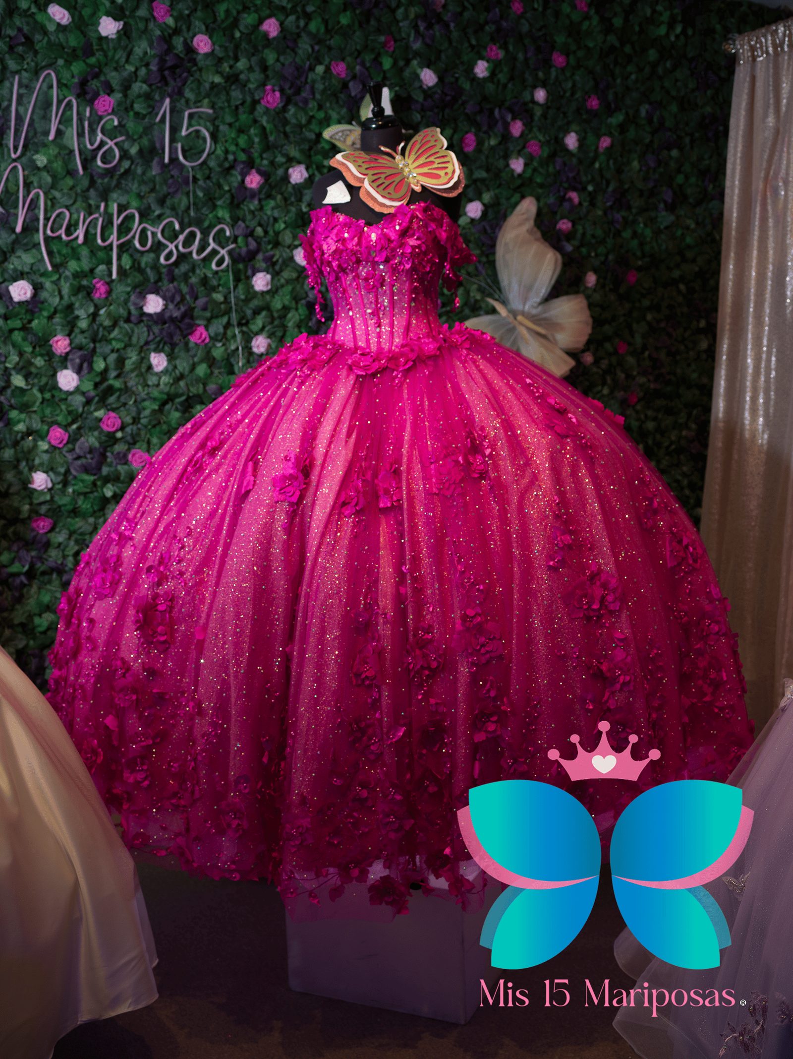 Mis 15 Mariposas fuchsia pink sparkle quinceañera ball gown with floral appliqué